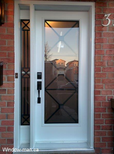 Single front steel insulated entry door and one sidelight. Modern Townsbridge iron design